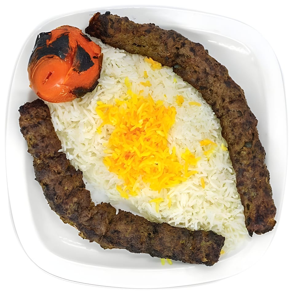 Two Persian kabobs, a grilled tomato, and saffron rice on a white plate.